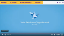 Screenshot des EKD-Videos "Wie falte ich eine Friedenstaube"